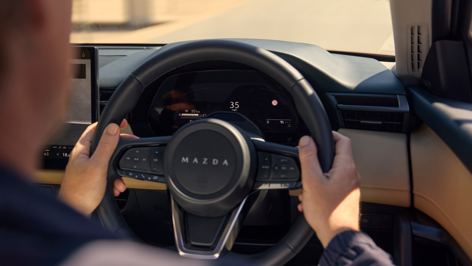 DRIVER-FOCUSED COCKPIT